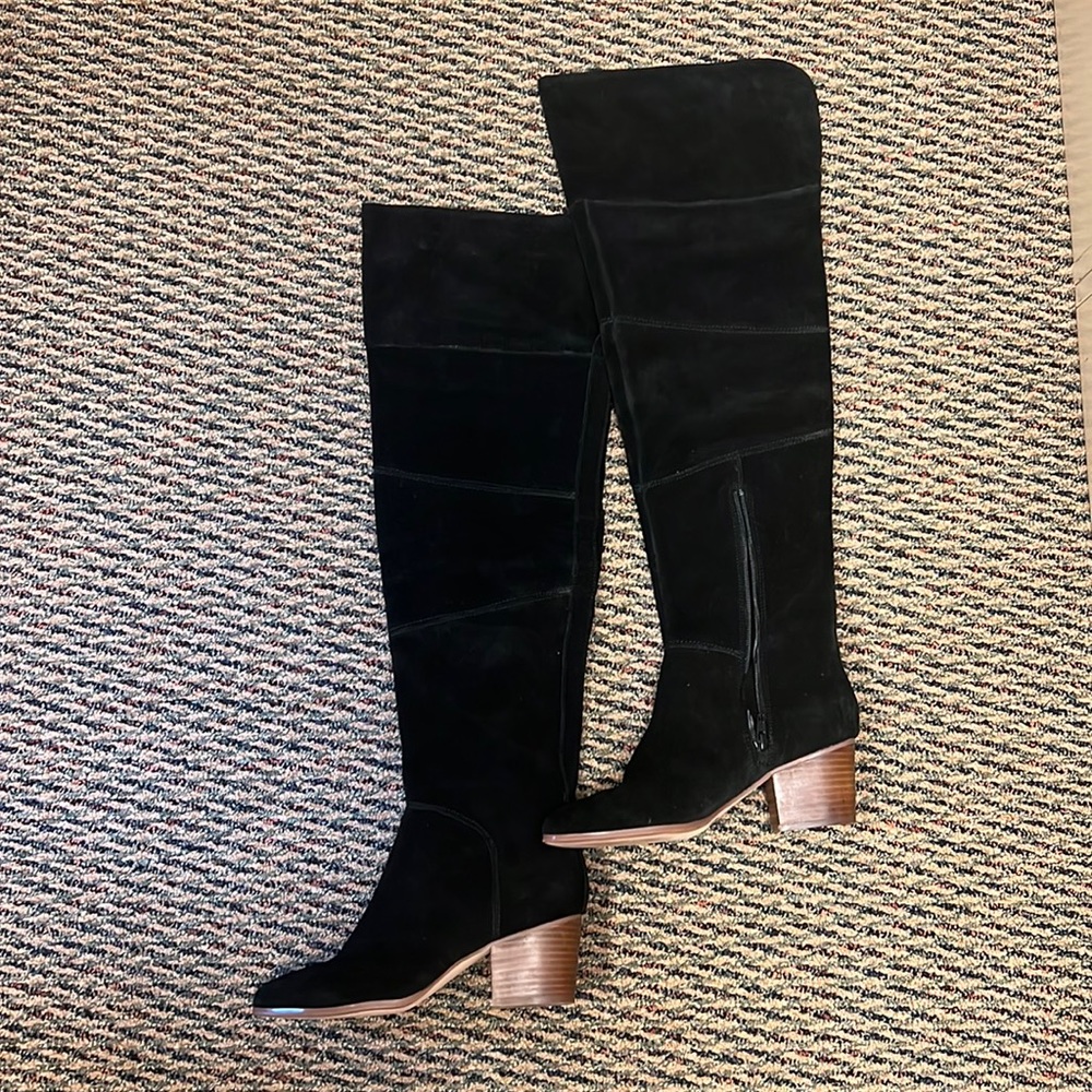 Women’s suede thigh high boots.